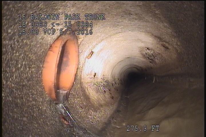 Tap Break-In Intruding, at 11 o'clock, -, -, within 8 inches of joint: YES, 6", 1" - ACTIVE