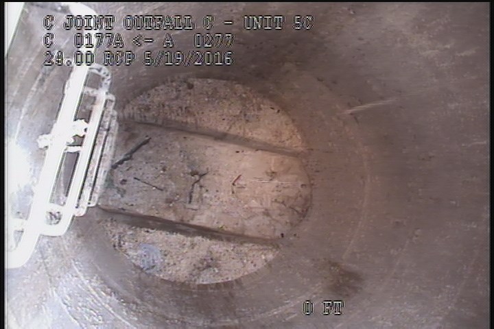 Downstream Manhole, Survey Begins - 1:36 PM