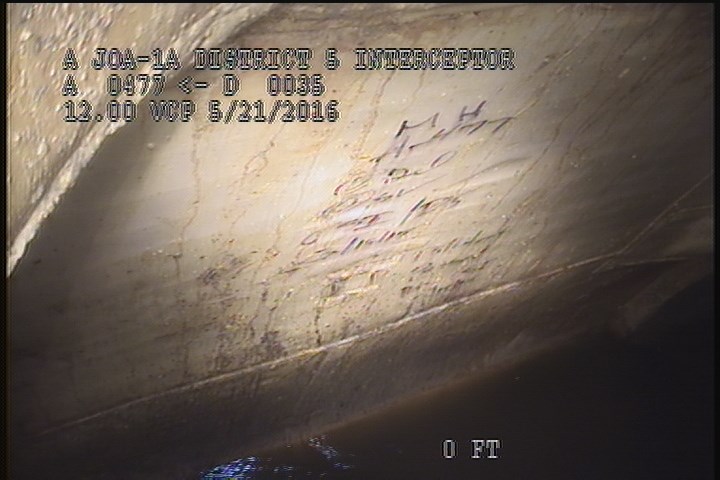 Downstream Manhole, Survey Begins - 12:15 PM