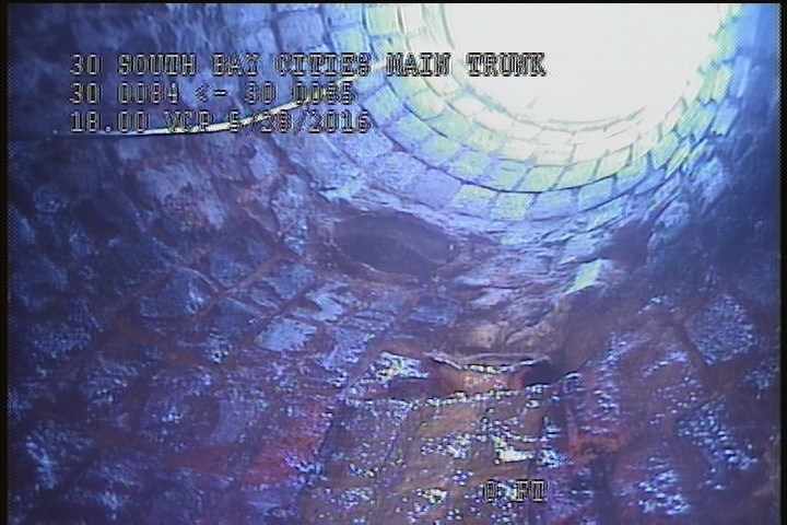 General Observation - ACTIVE DROP CONN. INSIDE THE MH. @ 09 O'CLOCK