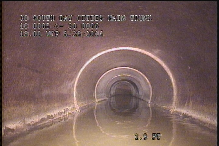 Downstream Manhole, Survey Begins - 8:16 AM