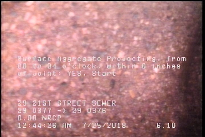 Surface Aggregate Projecting, from 08 to 04 o'clock, within 8 inches of joint: YES, Start