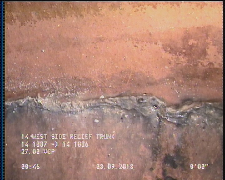 Deposits Attached Encrustation, 5 %of cross sectional area, from 04 to 08 o'clock, , within 8 inches of joint: YES, Start