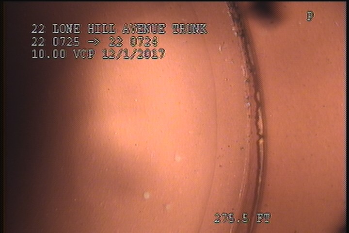 Crack Spiral, from 07 to 05 o'clock, within 8 inches of joint: YES