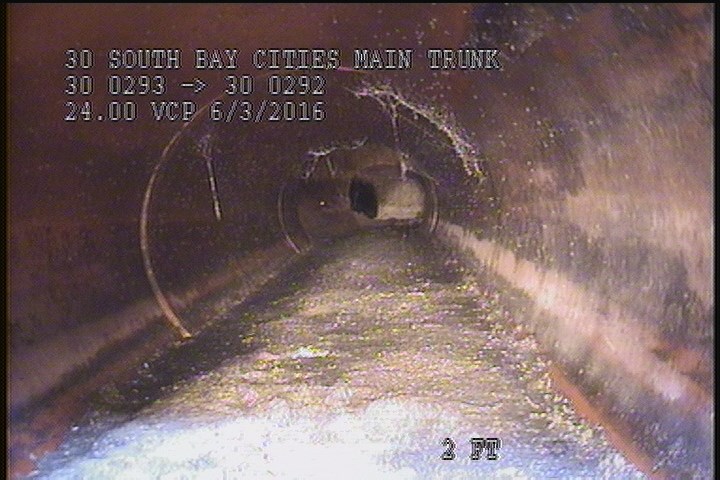 Deposits Attached Other, 15 %of cross sectional area, from 04 to 08 o'clock, , within 8 inches of joint: YES - SLUDGE
