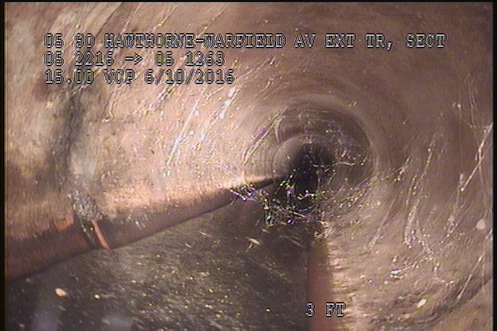 Deposits Settled Gravel, 10 %of cross sectional area, from 05 to 07 o'clock, , within 8 inches of joint: YES