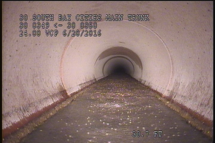 Deposits Attached Other, 15 %of cross sectional area, from 05 to 07 o'clock, , within 8 inches of joint: YES, Start - SLUDGE/GREASE