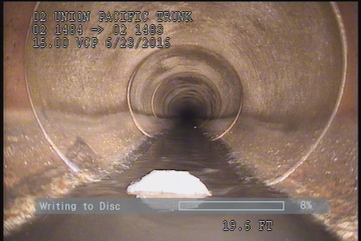 Deposits Settled Other, 5 %of cross sectional area, from 05 to 07 o'clock, , within 8 inches of joint: YES - CONCRETE PIECE