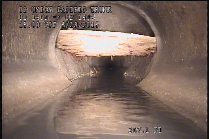 General Observation - WOOD PLATE ON SHELVES COVERING PIPE