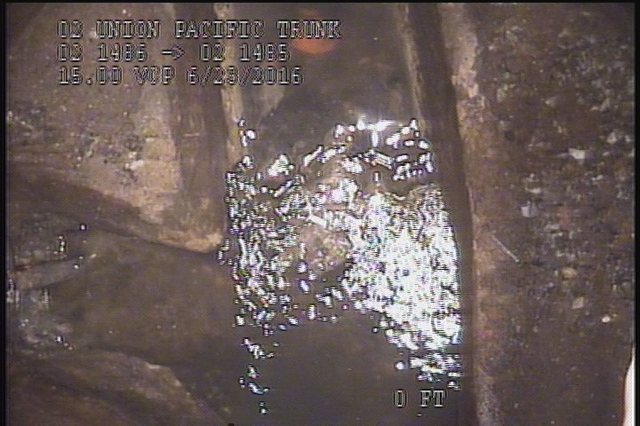 Deposits Settled Other, 10 %of cross sectional area, from 05 to 07 o'clock, , within 8 inches of joint: NO - CONCRETE PIECES