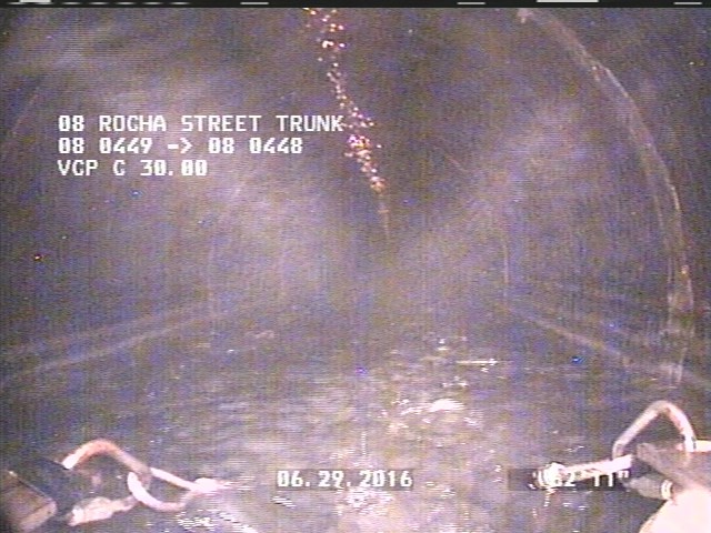 General Observation - 30" VCP -DARK OILY COATING