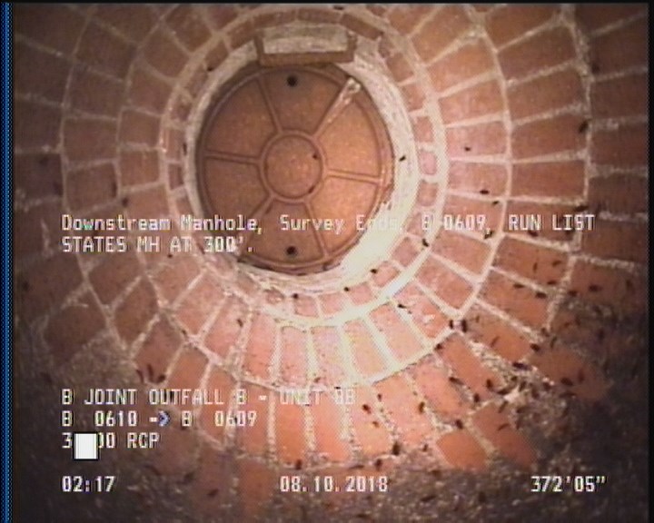 Downstream Manhole, Survey Ends - B 0609, RUN LIST STATES MH AT 300'.