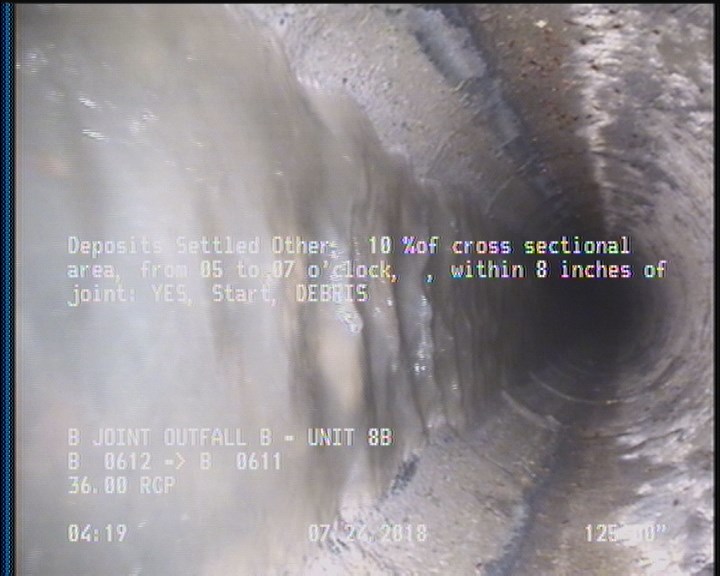 Deposits Settled Other, 10 %of cross sectional area, from 05 to 07 o'clock, , within 8 inches of joint: YES, Start - DEBRIS
