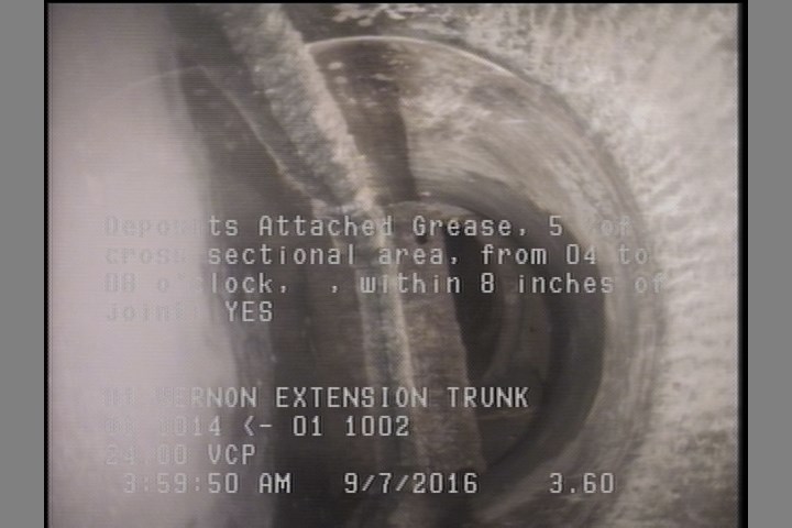 Deposits Attached Grease, 5 %of cross sectional area, from 04 to 08 o'clock, , within 8 inches of joint: YES