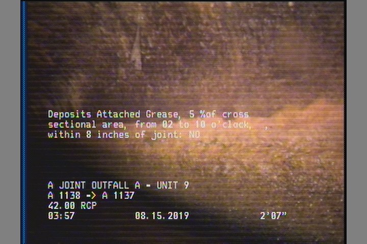 Deposits Attached Grease, 5 %of cross sectional area, from 02 to 10 o'clock, , within 8 inches of joint: NO