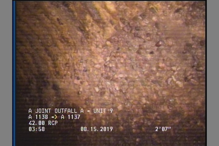 Surface Aggregate Projecting, from 09 to 03 o'clock, within 8 inches of joint: NO