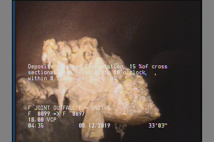 Deposits Attached Encrustation, 15 %of cross sectional area, from 08 to 10 o'clock, , within 8 inches of joint: NO