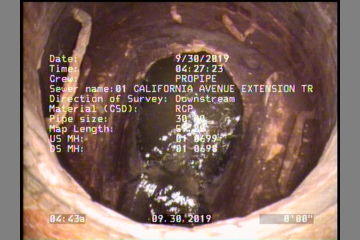 Upstream Manhole, Survey Begins - 01 0699