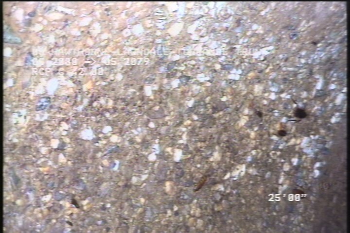 Surface Aggregate Projecting, from 08 to 04 o'clock, within 8 inches of joint: NO - SEVERE AGT