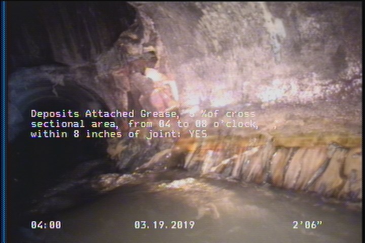 Deposits Attached Grease, 5 %of cross sectional area, from 04 to 08 o'clock, , within 8 inches of joint: YES
