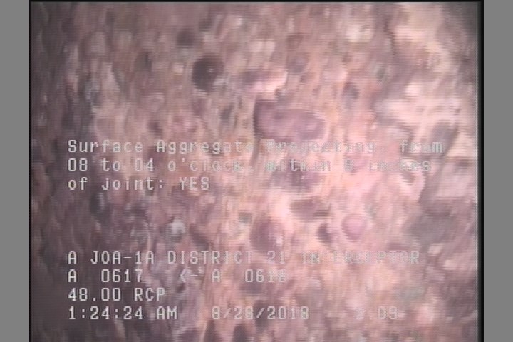Surface Aggregate Projecting, from 08 to 04 o'clock, within 8 inches of joint: YES