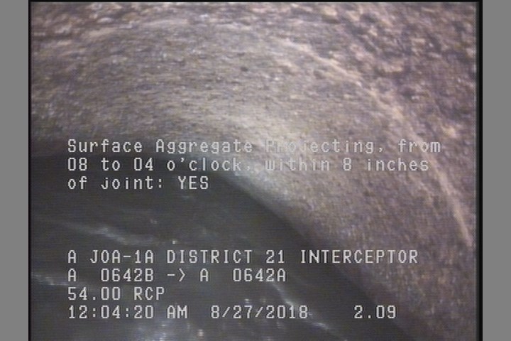 Surface Aggregate Projecting, from 08 to 04 o'clock, within 8 inches of joint: YES
