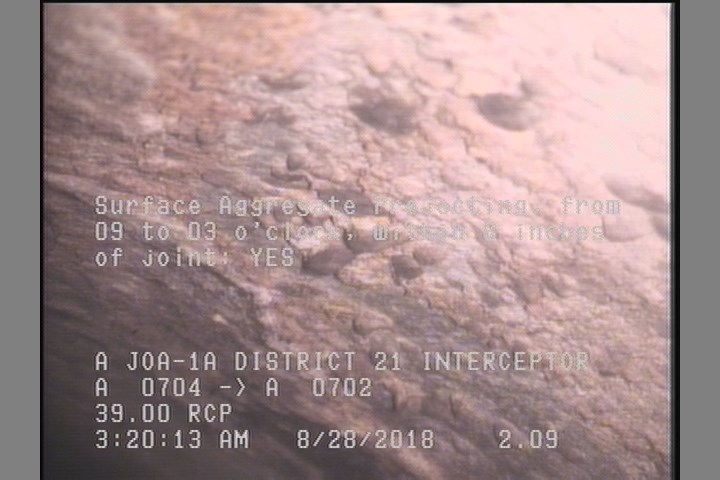 Surface Aggregate Projecting, from 09 to 03 o'clock, within 8 inches of joint: YES