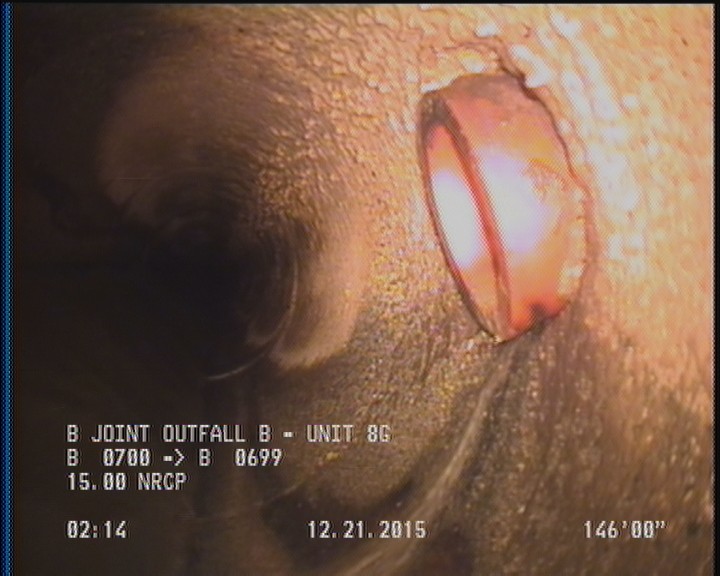 Tap Break-In Intruding, at 02 o'clock, -, #v, within 8 inches of joint: NO, 6", 2"