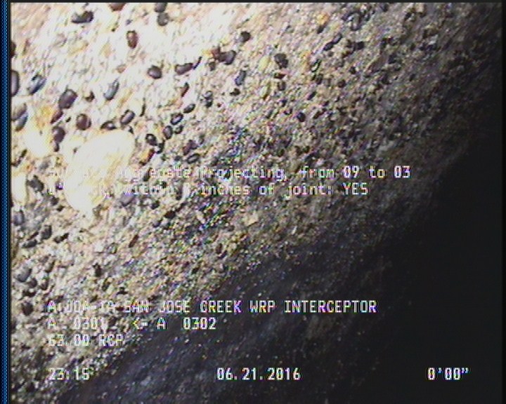 Surface Aggregate Projecting, from 09 to 03 o'clock, within 8 inches of joint: YES