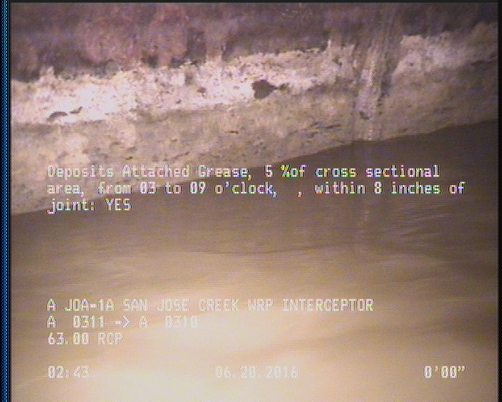 Deposits Attached Grease, 5 %of cross sectional area, from 03 to 09 o'clock, , within 8 inches of joint: YES