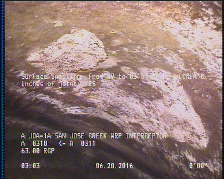 Surface Spalling, from 09 to 03 o'clock, within 8 inches of joint: YES