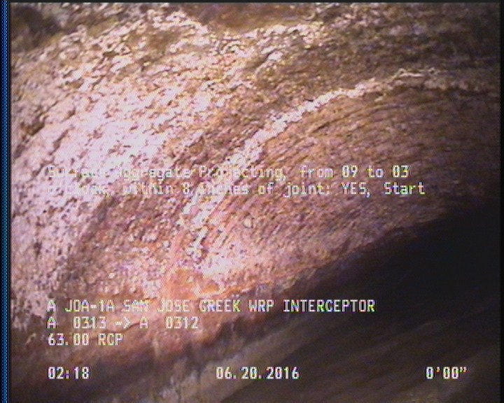 Surface Aggregate Projecting, from 09 to 03 o'clock, within 8 inches of joint: YES