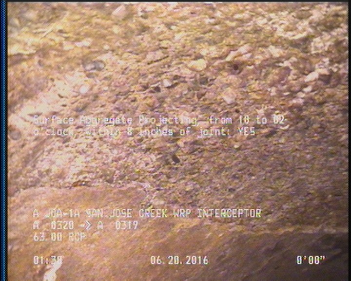 Surface Aggregate Projecting, from 10 to 02 o'clock, within 8 inches of joint: YES