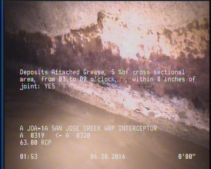 Deposits Attached Grease, 5 %of cross sectional area, from 03 to 09 o'clock, , within 8 inches of joint: YES