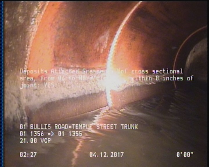 Deposits Attached Grease, 5 %of cross sectional area, from 04 to 08 o'clock, , within 8 inches of joint: YES