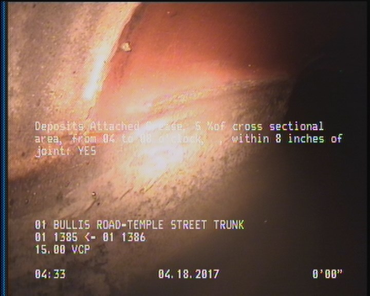 Deposits Attached Grease, 5 %of cross sectional area, from 04 to 08 o'clock, , within 8 inches of joint: YES