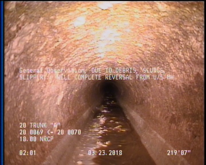 Survey Abandoned - DUE TO DEBRIS,SLUDGE, SLIPPERY. WILL COMPLETE REVERSAL FROM U/S MH.