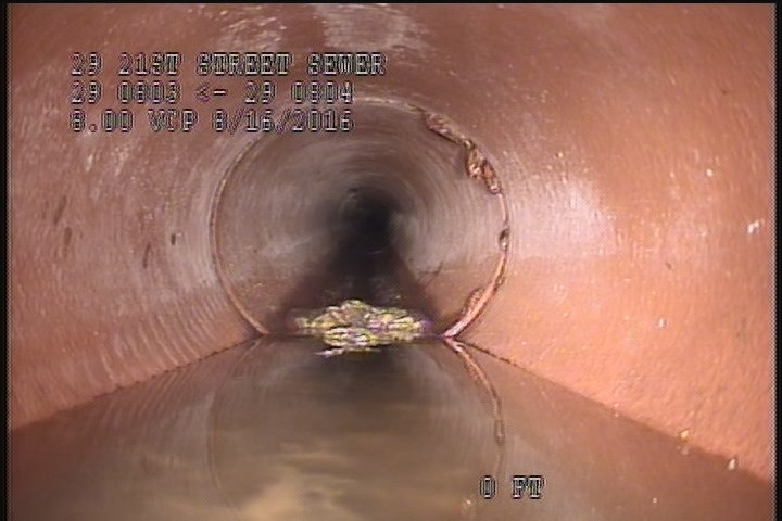 Downstream Manhole, Survey Begins - 9:08 AM