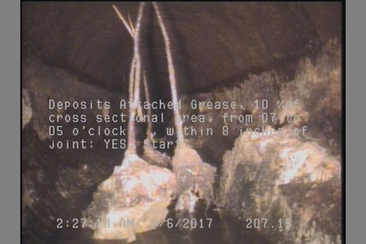 Deposits Attached Grease, 10 %of cross sectional area, from 07 to 05 o'clock, , within 8 inches of joint: YES, Start