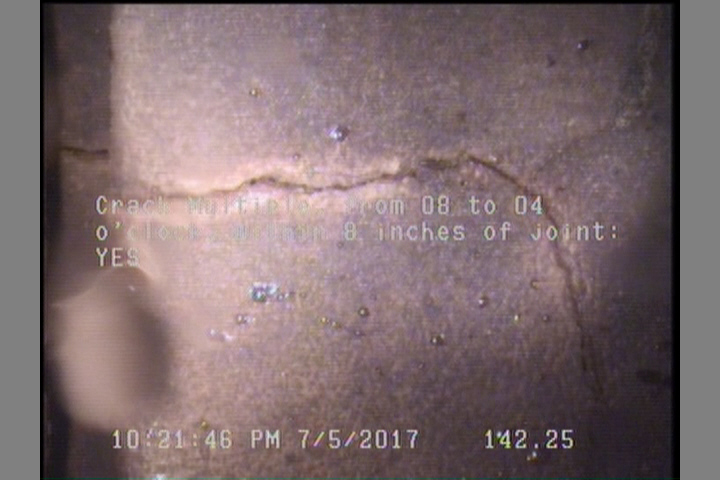 Crack Multiple, from 08 to 04 o'clock, within 8 inches of joint: YES