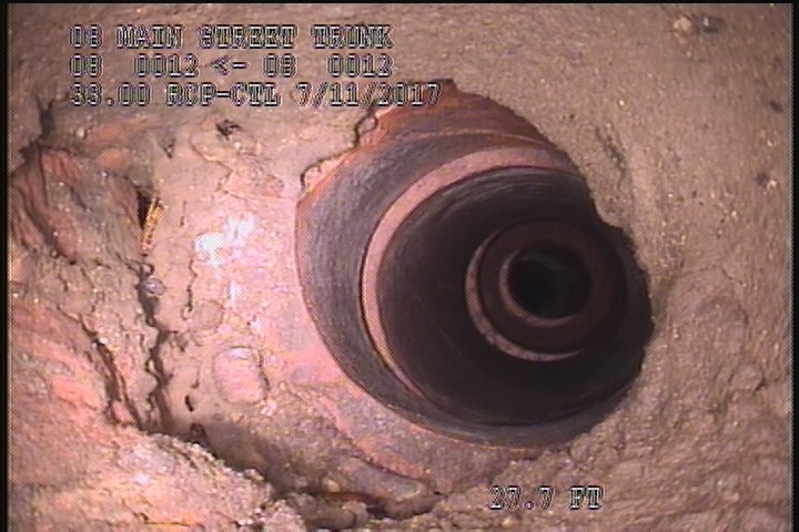 Tap Factory Made Abandoned, at 08 o'clock, -, within 8 inches of joint: NO, 4"