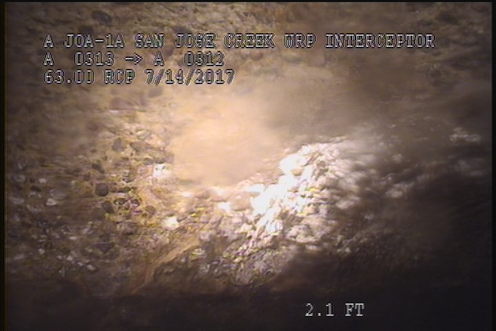 Surface Aggregate Projecting, from 09 to 03 o'clock, within 8 inches of joint: NO