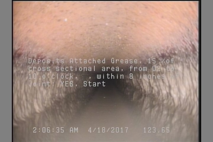 Deposits Attached Grease, 15 %of cross sectional area, from 02 to 10 o'clock, , within 8 inches of joint: YES, Start