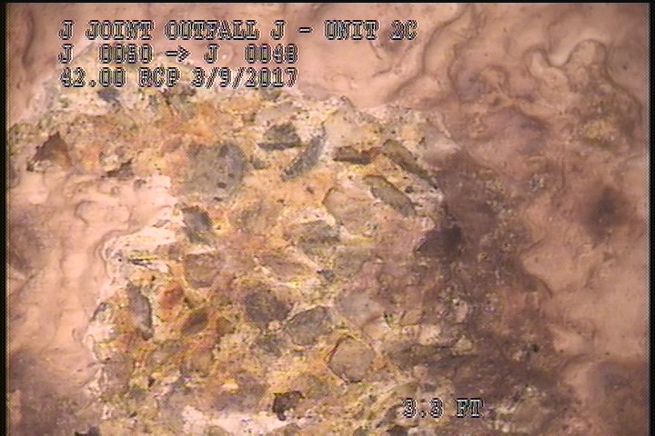 Surface Aggregate Projecting, from 08 to 04 o'clock, within 8 inches of joint: YES, Start - SEVERE AGG UNDER MAG COAT