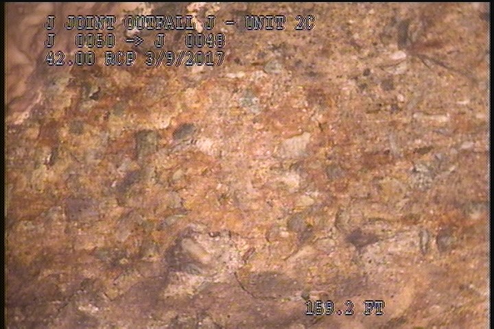 Surface Aggregate Projecting, from 08 to 09 o'clock, within 8 inches of joint: NO - SEVERE AGG