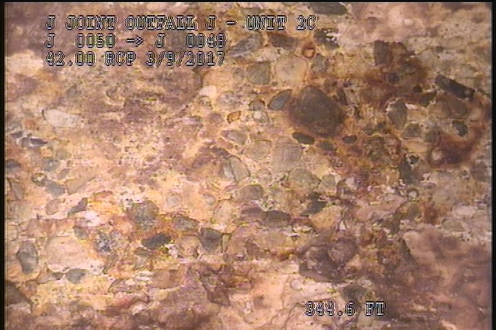 Surface Aggregate Projecting, from 03 to 04 o'clock, within 8 inches of joint: YES - SEVERE AGG