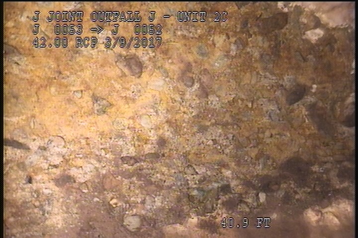 Surface Aggregate Projecting, from 08 to 04 o'clock, within 8 inches of joint: YES - SEVERE AGG