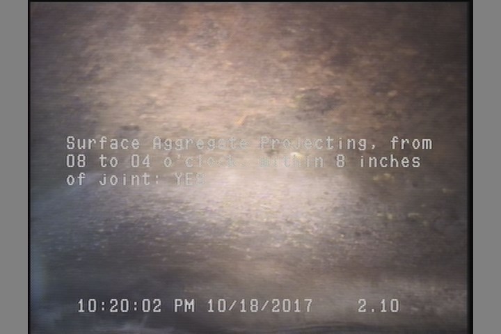 Surface Aggregate Projecting, from 08 to 04 o'clock, within 8 inches of joint: YES