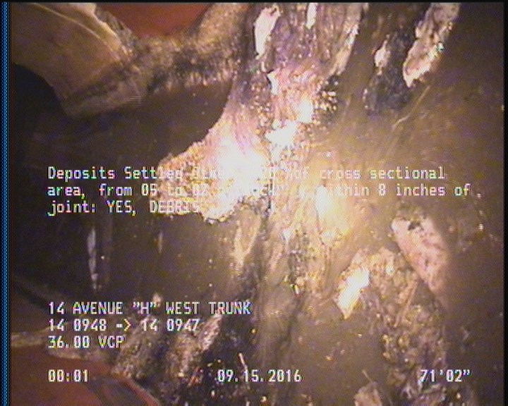 Deposits Settled Other, 20 %of cross sectional area, from 05 to 07 o'clock, , within 8 inches of joint: YES - DEBRIS