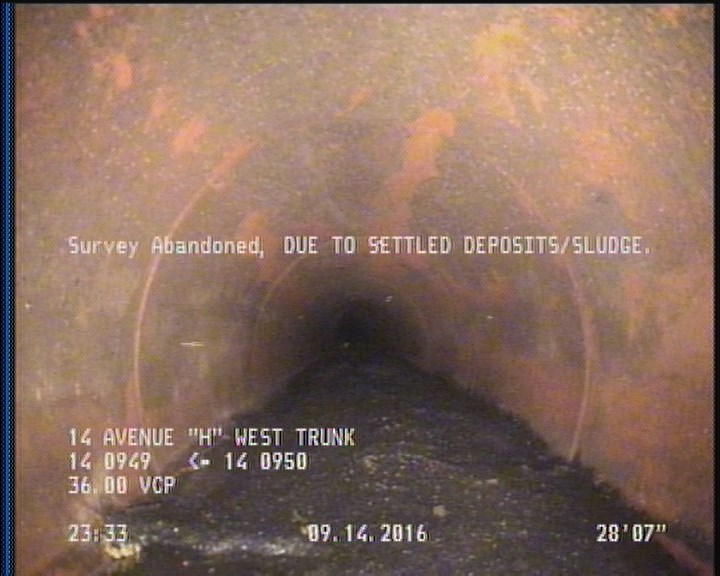 Survey Abandoned - DUE TO SETTLED DEPOSITS/SLUDGE.